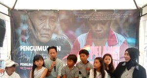 Pelangi di tengah Hujan